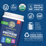 Container of plant-based organic protein powder with certifications and recycling symbols on blue background