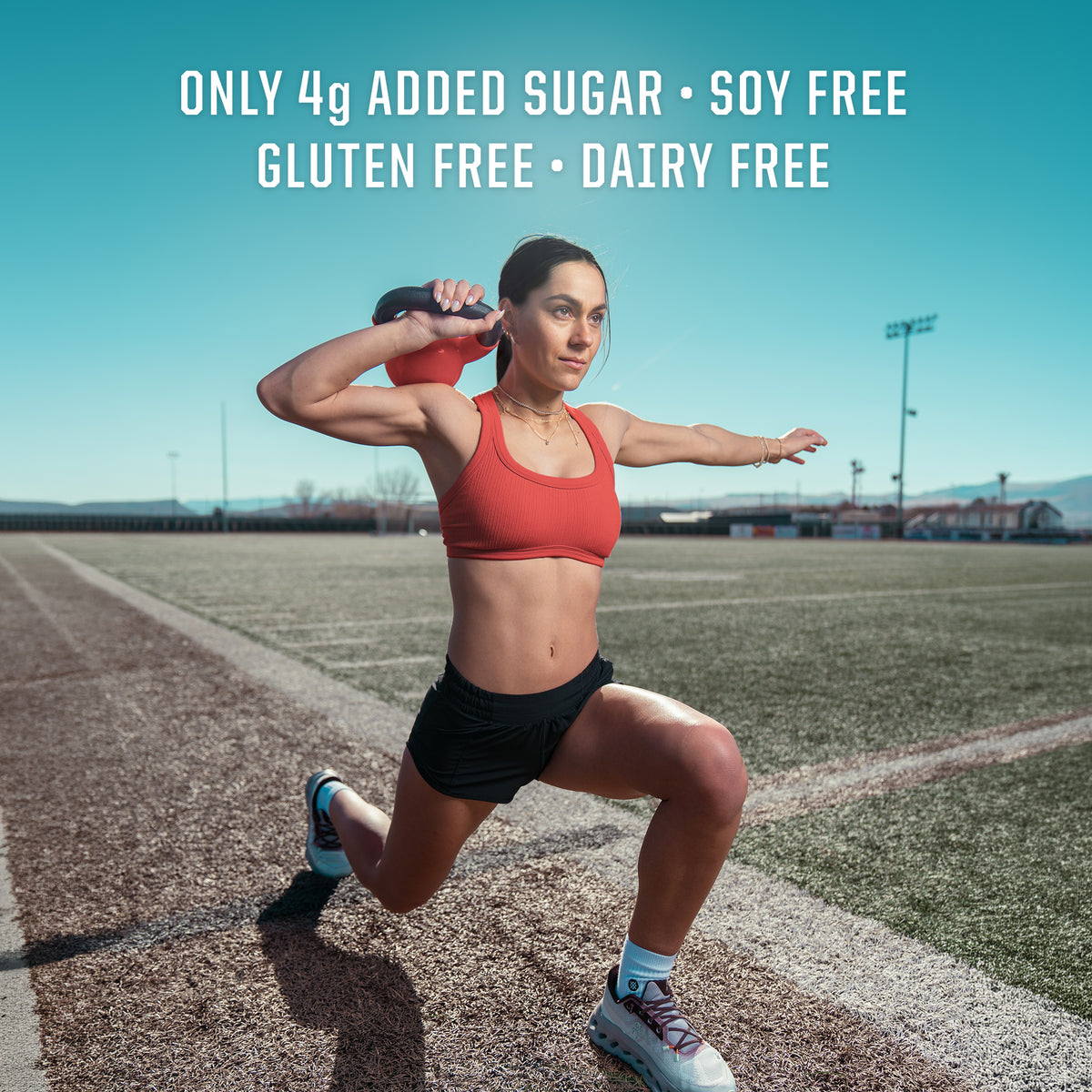 Woman in athletic wear lunging on track with text about sugar and allergen-free qualities above