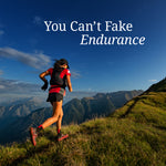 Woman trail running uphill on grassy mountain slope under blue sky with text 
